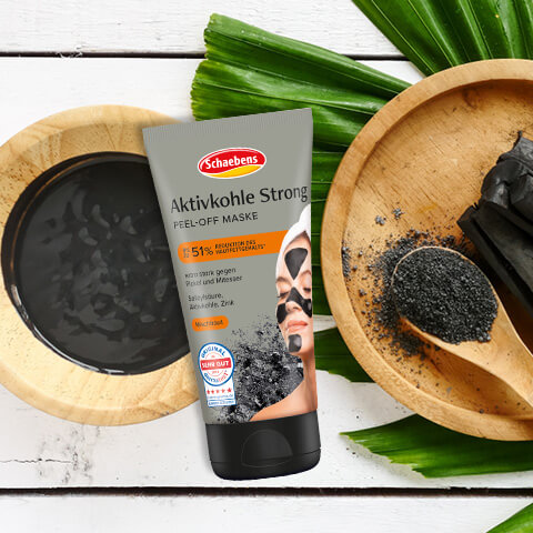 Aktivkohle-Strong-Peel-Off-Maske-Tube-Flatlay